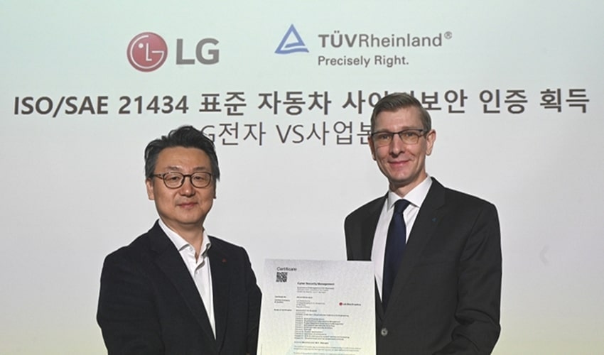 An image of two men holding a certificate